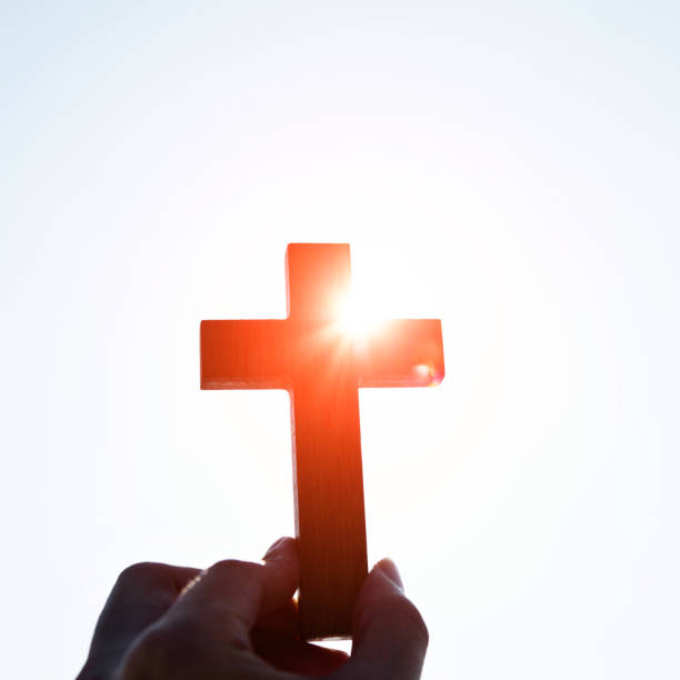 istock Human hand holding wooden cross 845931410