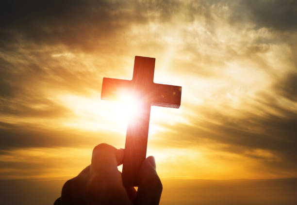 istock Human hand holding wooden cross 845931502
