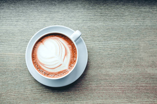 istock Coffee cup on wood vintage tone 845935344