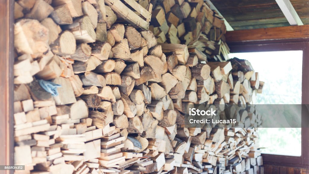 Piles of wood Different types of wood prepared for processing Austria Stock Photo