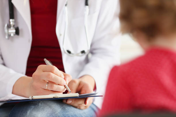 istock Little child with mother at pediatrician reception 845940100