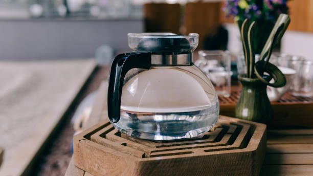 istock Brewing tea in a teapot during a tea ceremony close-up. Brewing tea in the old way with stirring with hot water. Tea tasting during the tea ceremony 845942346