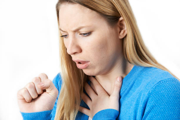 istock Young Woman Suffering With Cough 845943110