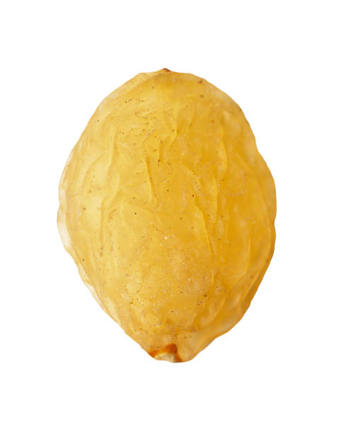 istock yellow raisins on a white background. macro 845945910