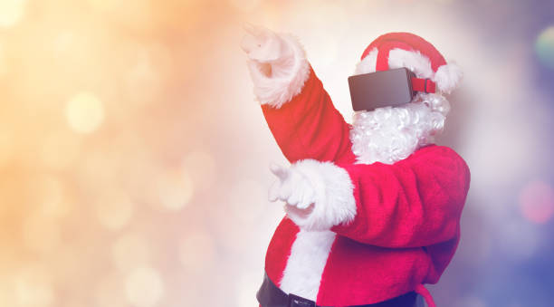 istock Funny Santa Claus have a joy with VR glasses 845946332