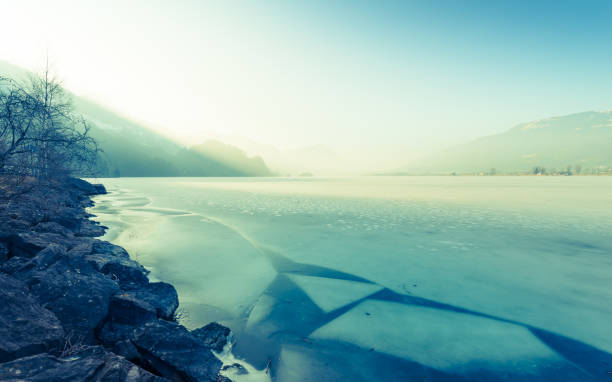 istock 4 Seasons. Ice on the lake. Winter landscape. 845947020