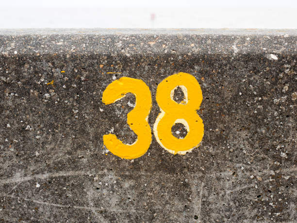istock a yellow numbering with paint on sea front wall Harwich 38 845950020