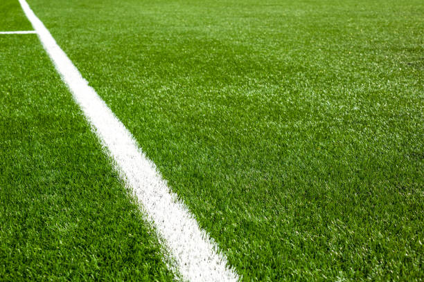 istock White line on a soccer field grass 845953230