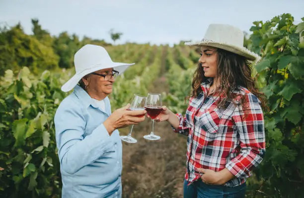 Grandmother and granddaughter vineyard