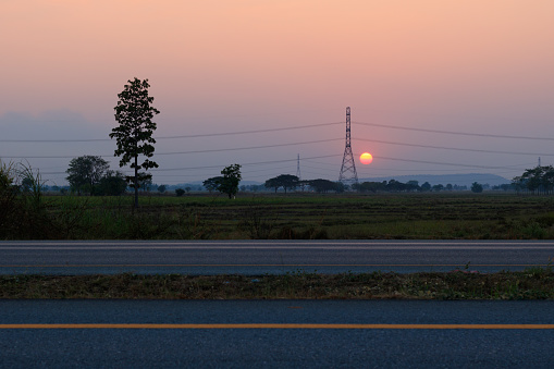 Electric transmission line during sunset