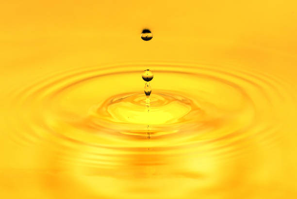 istock A drop of golden water. macro 845955524