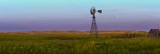 4 jahreszeiten western nebraska sand hills landschaft mit windmühle - house dawn sunset usa stock-fotos und bilder