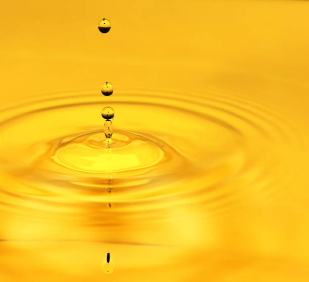 istock A drop of golden water. macro 845956144