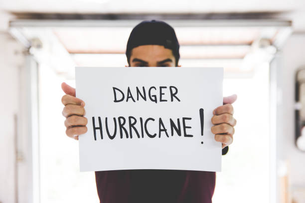 istock Young Adult Man Holding White Paper 845965440