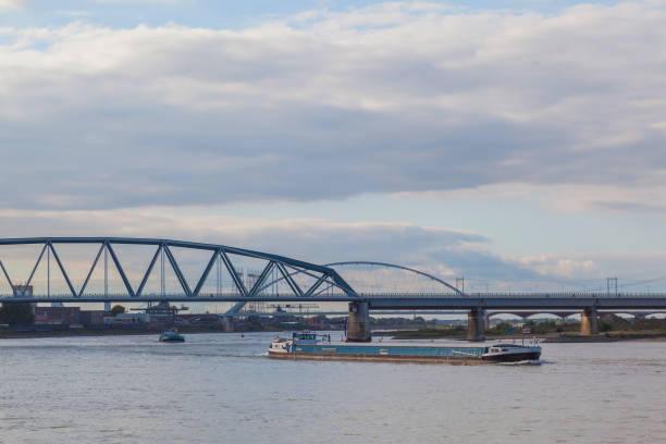 istock Cargo ship in Waal river at Nijmegen 845965706