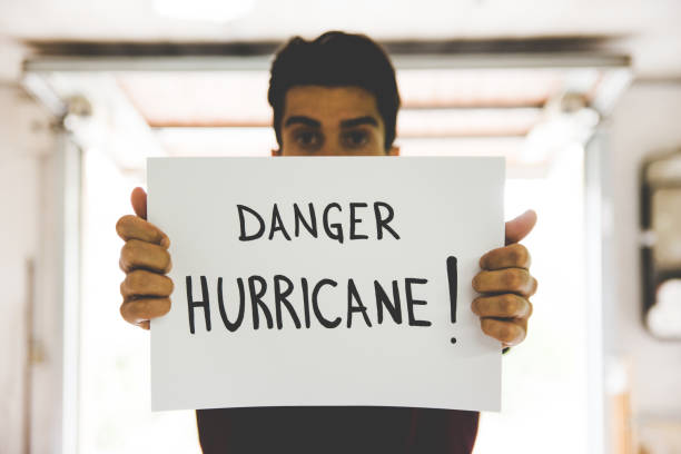 istock Young Adult Man Holding White Paper 845966636