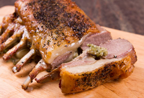 Welsh lamb rack A cooked rack of lamb on a board. welsh culture stock pictures, royalty-free photos & images
