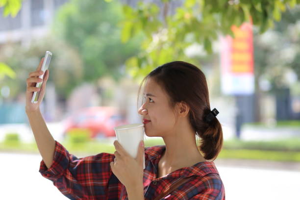 istock Young girl using smartphone in Vietnam 845967112