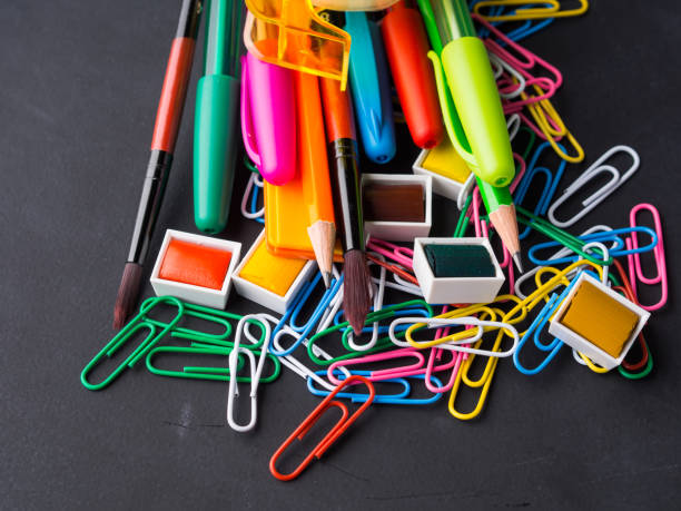 istock Colorful stationery back to school concept on dark 845971674
