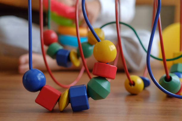 istock kid play wooden toy 845980726