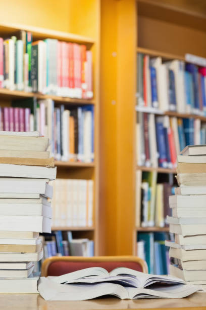 istock Piles of books on desk 845985158