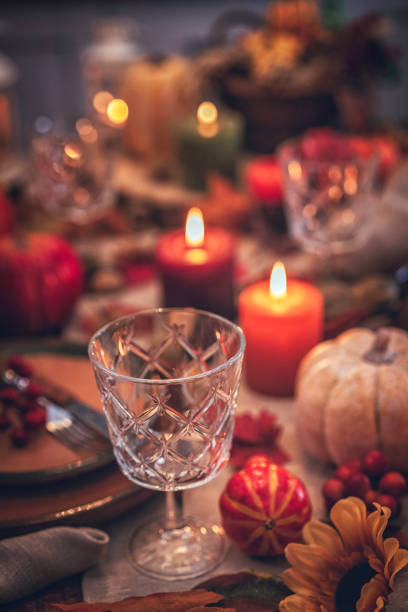 istock Decorated Table for Thanksgiving Dinner with Candles, Pumpkins, Leafs and Nuts 845985198