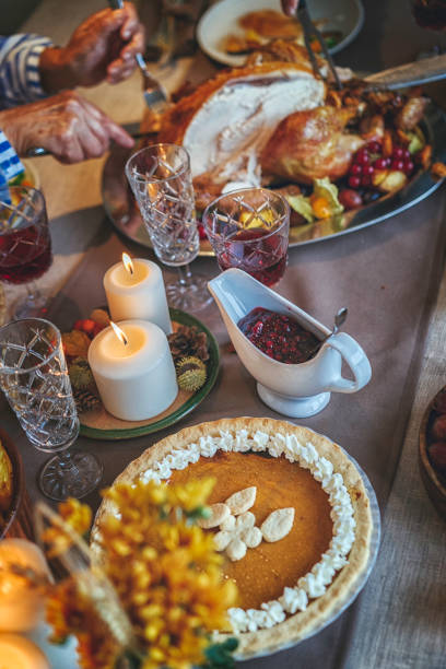 istock Family Having Traditional Holiday Stuffed Turkey Dinner 845988514