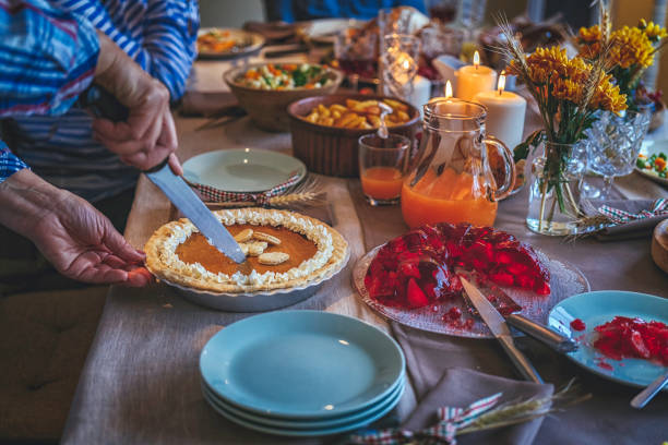 istock Family Having Traditional Holiday Stuffed Turkey Dinner 845988540