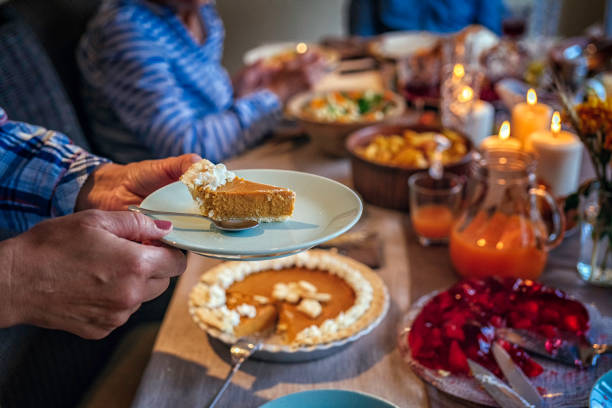 istock Family Having Traditional Holiday Stuffed Turkey Dinner 845988604