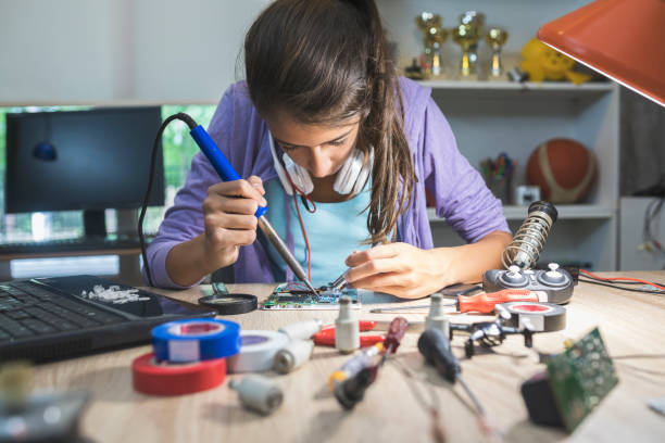 Scientific project Teenage girl working on school project girl flex stock pictures, royalty-free photos & images