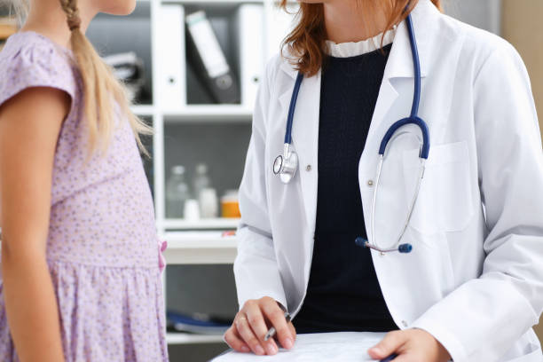 istock Little child at pediatrician reception 845989304