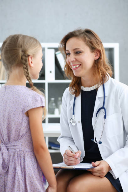 istock Little child at pediatrician reception 845989314