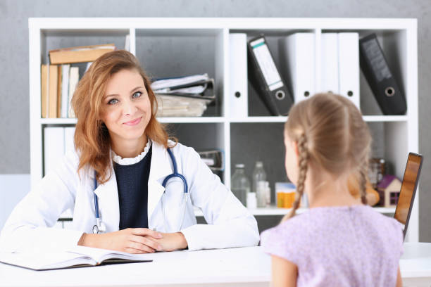 istock Little child at pediatrician reception 845989398