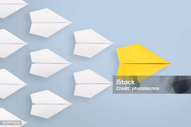 Leadership Concepts With Yellow Paper Plane Leading Among White Stock Photo - Download Image Now