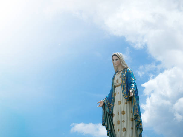 istock The Blessed Virgin Mary Statue blue sky background. 845992968