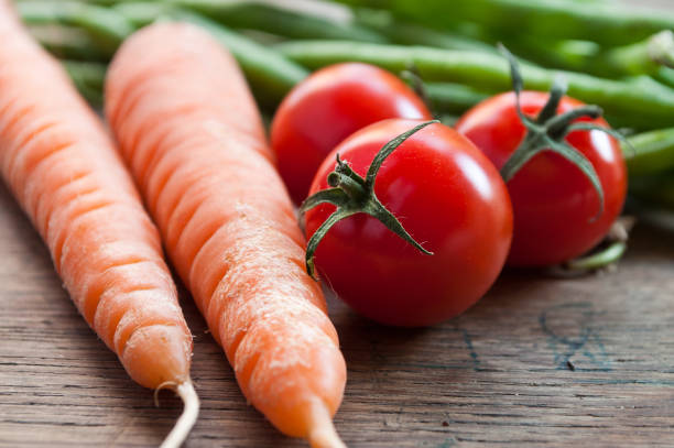 istock group of fresh vegetables on wooden background 845995442