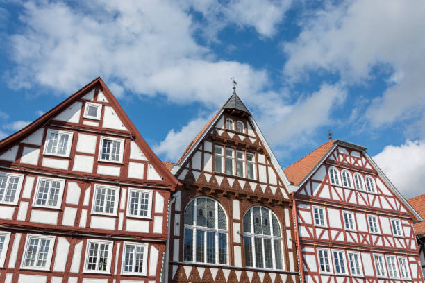 istock Three historic half timbered houses with blue sky and clouds 846000090
