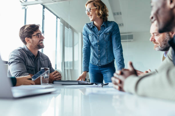 istock Young businesswoman talking with colleagues 846006070