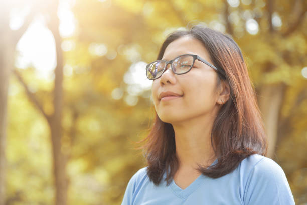 istock Asian woman breathing deep fresh air. 846006172