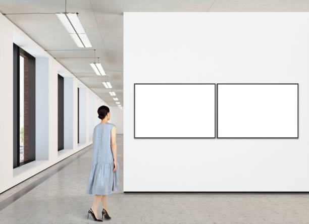 istock Woman looking at blank poster in modern gallery 846006600