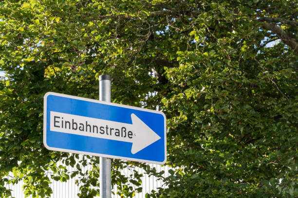 istock A German One Way street sign with trees in the background 846007100