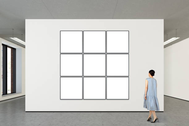istock Woman looking at blank poster in modern gallery 846007162