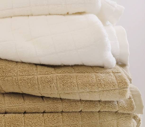 istock Pile of White and Brown Bath Towels 846009986