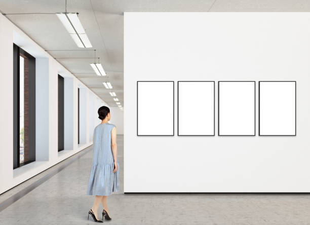 istock Woman looking at blank poster in modern gallery 846010158