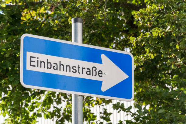 istock A German One Way street sign with trees in the background 846010692