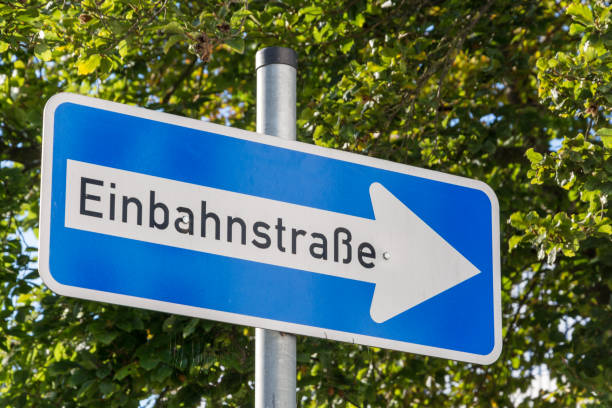 istock A German One Way street sign with trees in the background 846010696