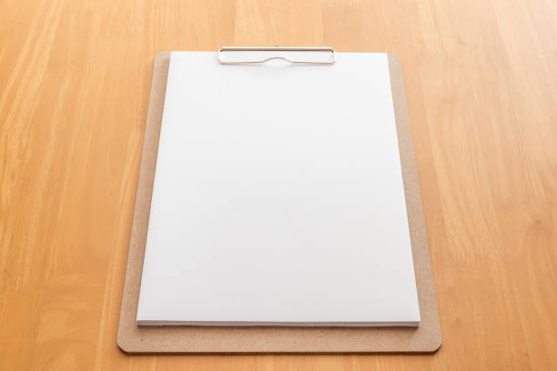 istock Wooden clipboard on wood background 846011688