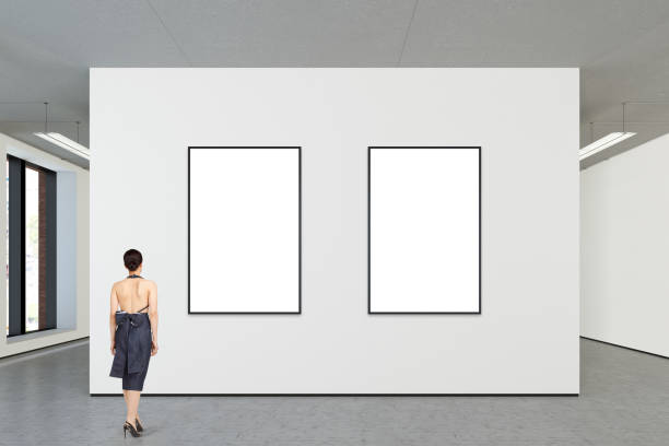 istock Woman looking at blank poster in modern gallery 846014590