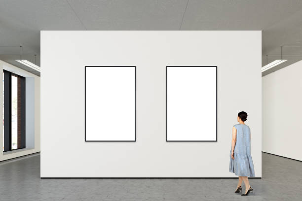 istock Woman looking at blank poster in modern gallery 846014768