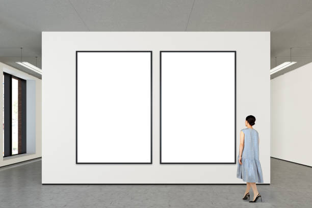 istock Woman looking at blank poster in modern gallery 846014834